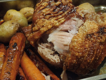 Slow-roast whole shoulder of pork with
cider-glazed carrots